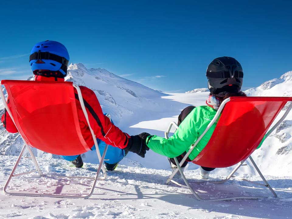 skiers relaxing on the slopes of the Tonale pass