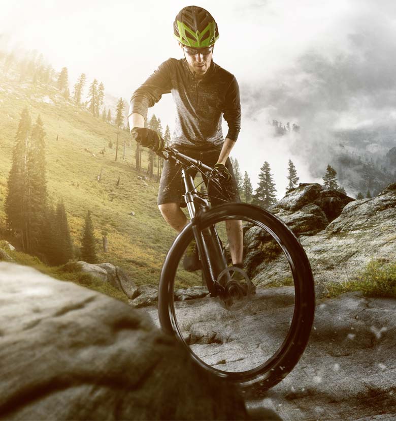 Cyclist with rented bike rental Delpero on the paths of the Tonale pass